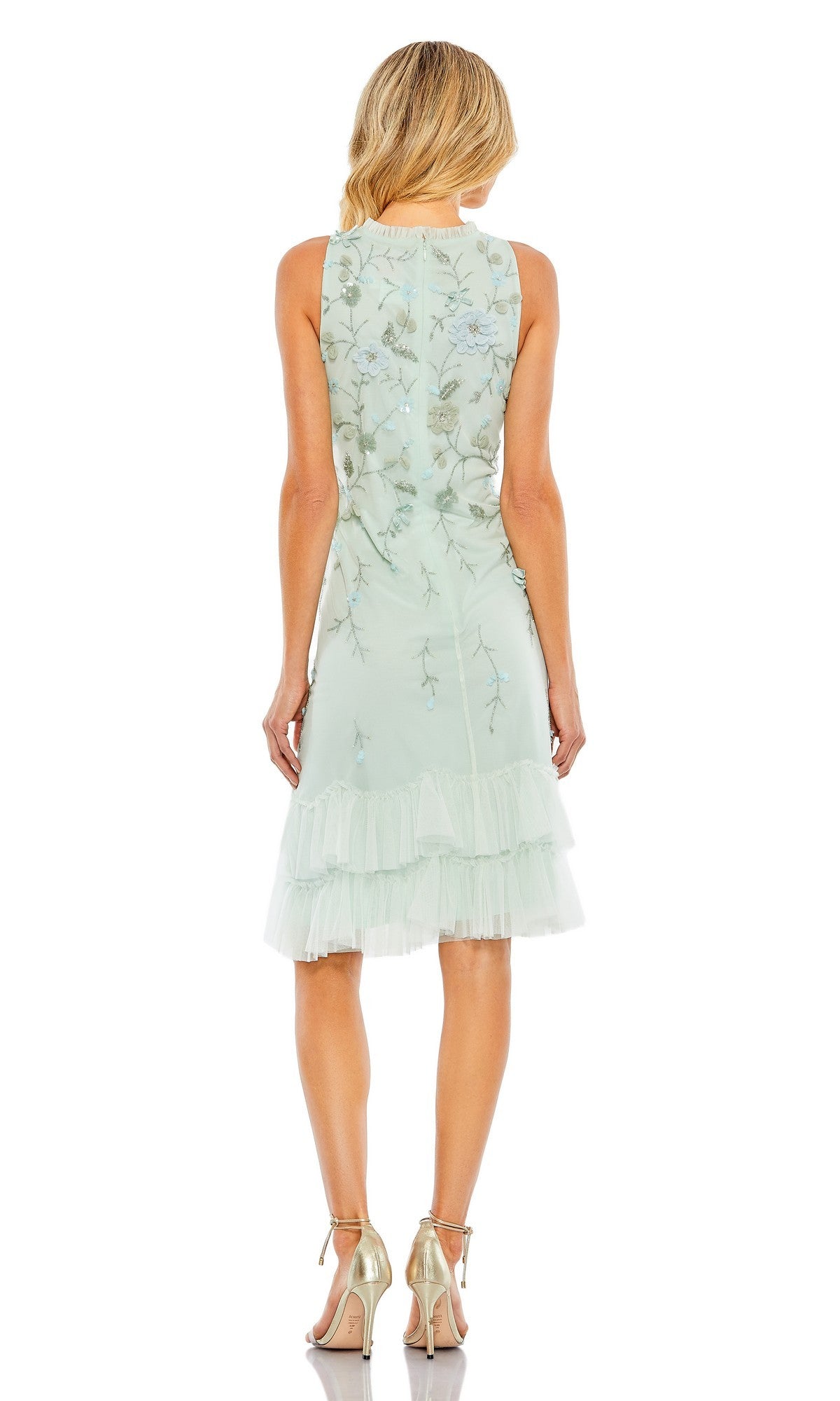 Woman wearing the Mac Duggal 9188 Midi Wedding Guest Dress, a sleeveless, light green floral design with embroidered details and ruffled hem—stylish from every angle and perfect for wedding guests.